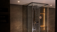 Cold Shower located in Sauna Area made of Clear Glass on all three sides
